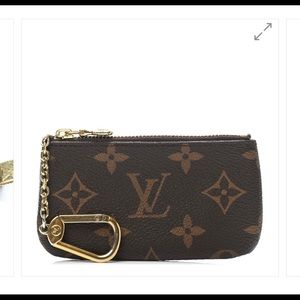 Louis Vuitton key pouch.